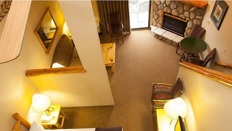 View  looking down into the living area in the accessible Loft Fireplace Suite